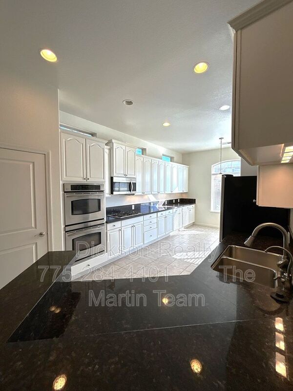 Photo - 9900 Wilbur May Pkwy