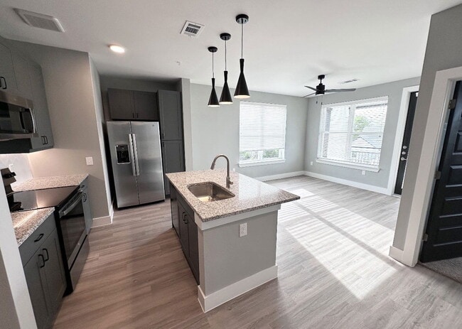 Building Photo - 5005 E Parmer Ln Unit 10108