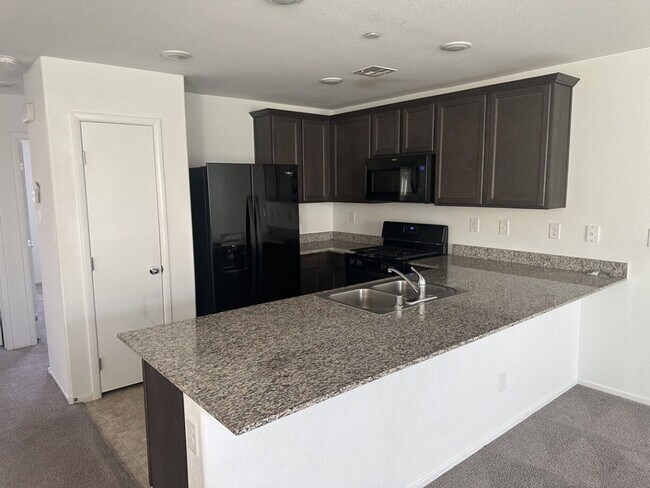 Photo - Townhouse with 2 car garage