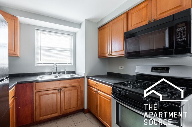 Building Photo - 1310 S 51st Ct Unit 202
