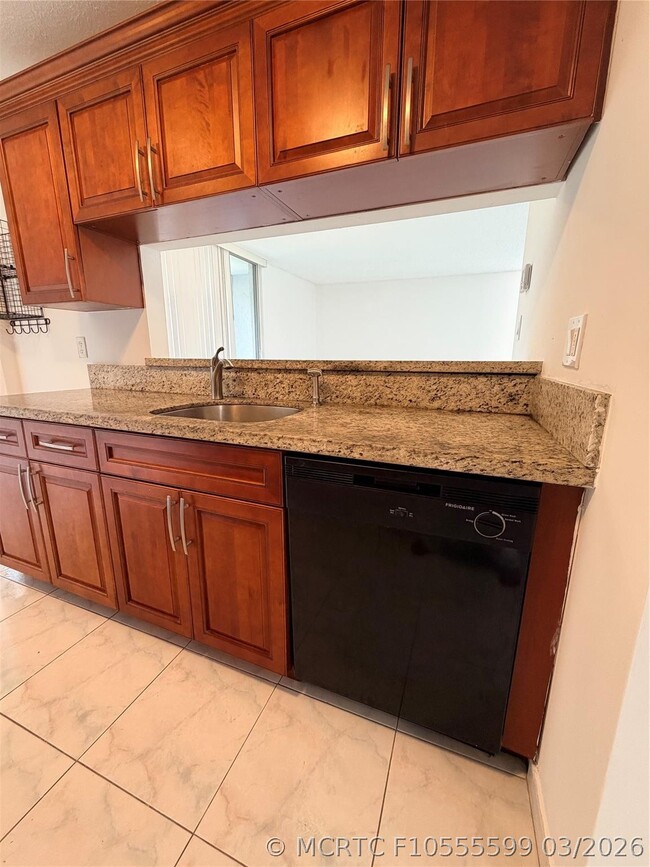 Building Photo - 3100 N Pine Island Rd Unit 310
