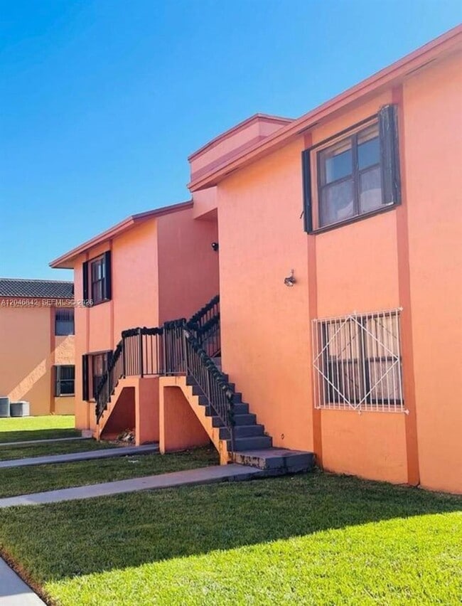 Building Photo - 6395 W 27th Ct Unit 201-7