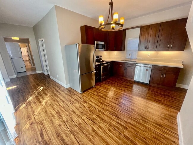 Photo - Prime Location! Modern 2BD/1 BA with A/C & EV Charging Steps from Mississippi