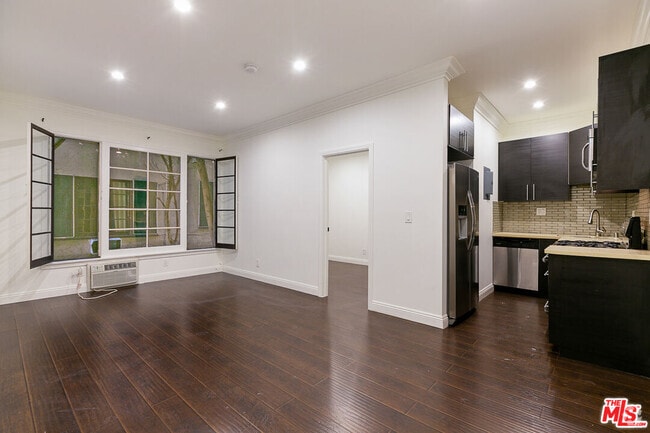 Building Photo - 7223 Willoughby Ave Unit 106 Rental