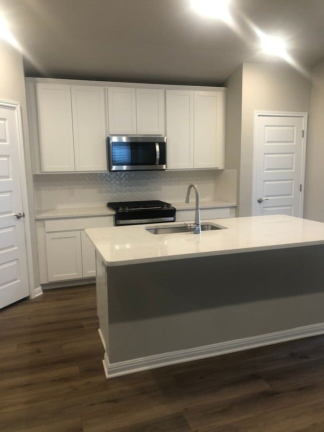 Photo - -=Available April 2026=-  4BR/2BA w/ Fenced Yard + Covered Parking in Hutto, TX