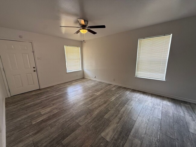 Photo - Charming 3-Bedroom Home with Hardwood Floors & Spacious Backyard