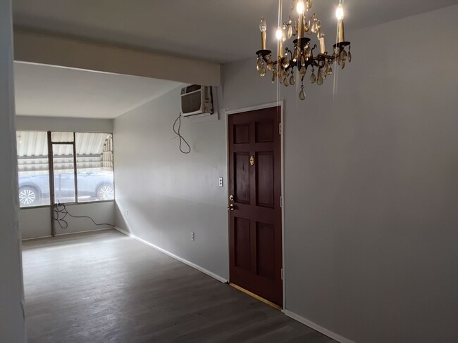 Photo - New Paint & New laminate flooring throughout home!!