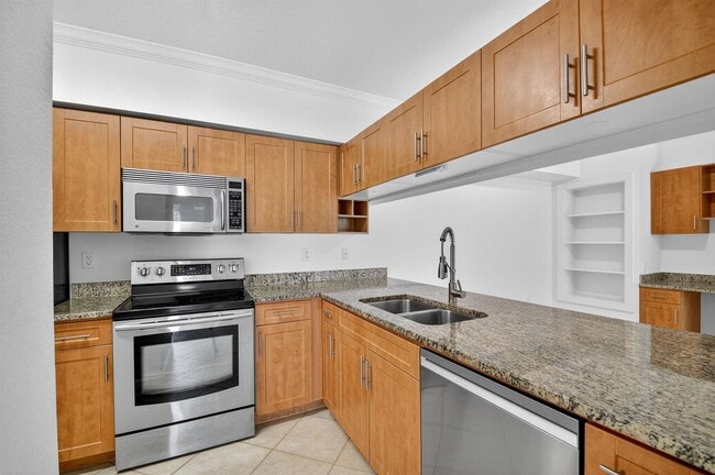 Building Photo - 6511 Emerald Dunes Dr Unit 304 Rental