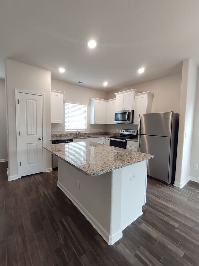 Photo - BRAND-NEW Townhome Located in Sanford- Minutes from Shopping, Dining, and Community Parks! Wont l...
