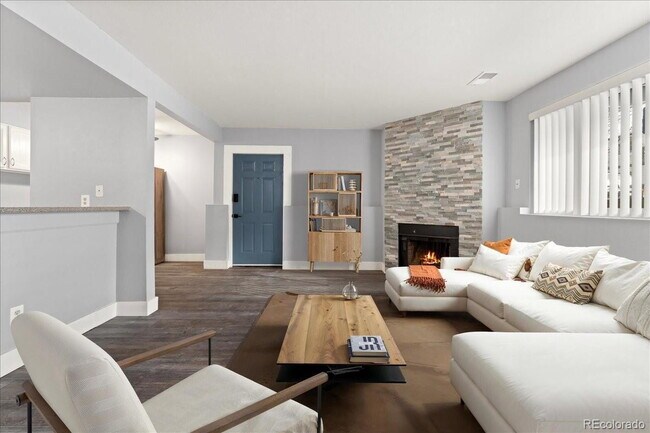Photo - "Charming 2-Bed Condo with Cozy Fireplace in Prime Arvada Location!" Unit #103