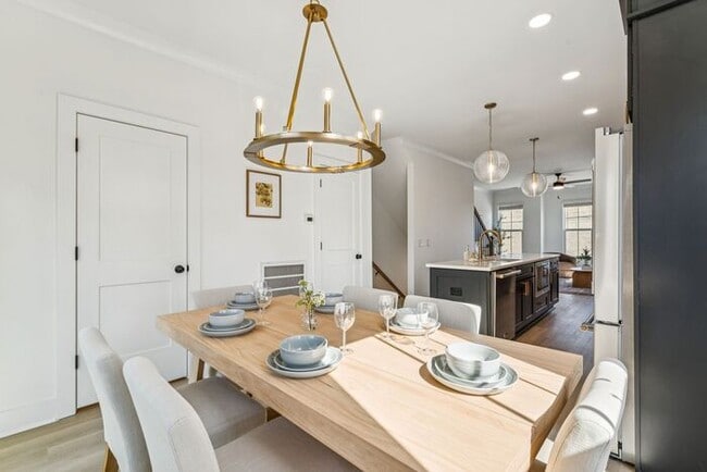 Photo - High-End 2BR Townhome | Rooftop Terrace + 2-Car Garage | 24-Unit Community