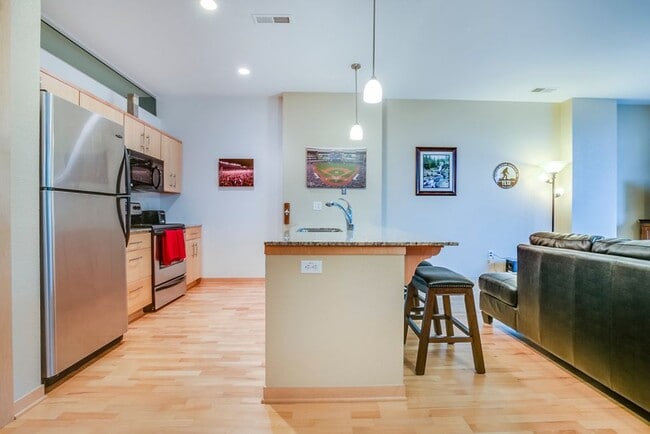 kitchen - 2 Granite counter tops and stainless steel appliances. - 601 E Ogden Ave Unit 307