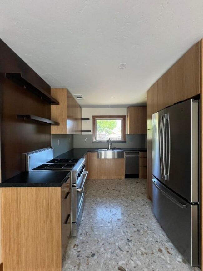 Photo - Artisan-Built Custom Cottage Retreat | Private Yard, Garage & EV Charging Ready