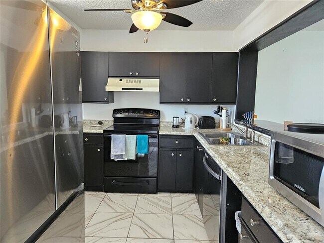 Photo - 7425 Bay Island Dr S Unit 303