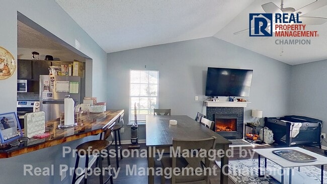 Photo - Charming 2BD/2 BA End Unit Townhouse w/Fireplace and Fenced Backyard