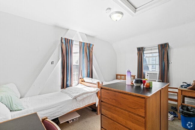 Quad, 0BA - 397SF - Bedroom