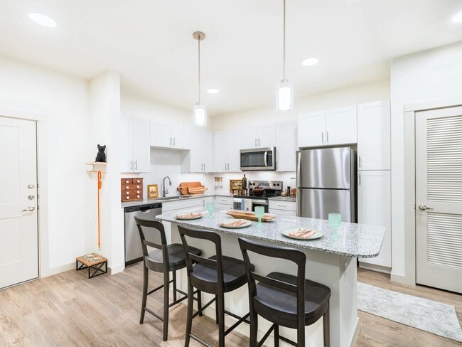 Homes feature gourmet kitchens with granite countertops, large chef’s island with built-in storage, and 42-inch custom cabinetry.