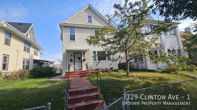 Building Photo - 3329 Clinton Ave Unit 1