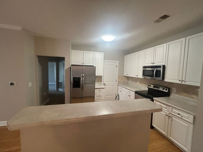 Photo - Don't miss this 4-bed, 3-bath condo TWO miles from the ocean! Unit 300GC 325