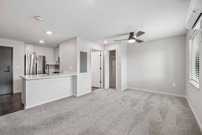 A spacious open-concept layout blends comfort and functionality, offering plenty of room to relax, gather, and enjoy everyday living.