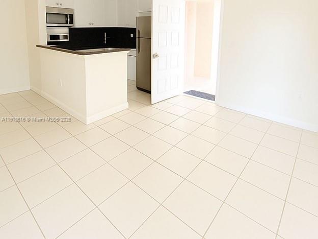 Building Photo - 4690 NW 102nd Ave Unit 101-24