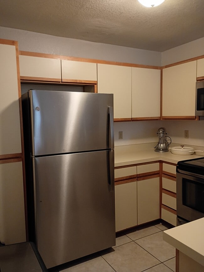 Kitchen with newer stainless stainless - 7618 E Callisto Cir Unit 122
