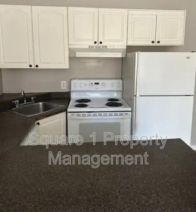 Photo - 11025 Jasper Ave Unit 114