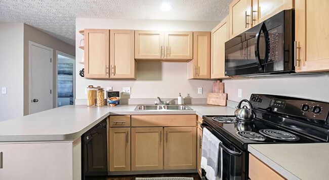 Energy-Efficient, Black Appliances - Abbie Lakes by Cortland Apartments