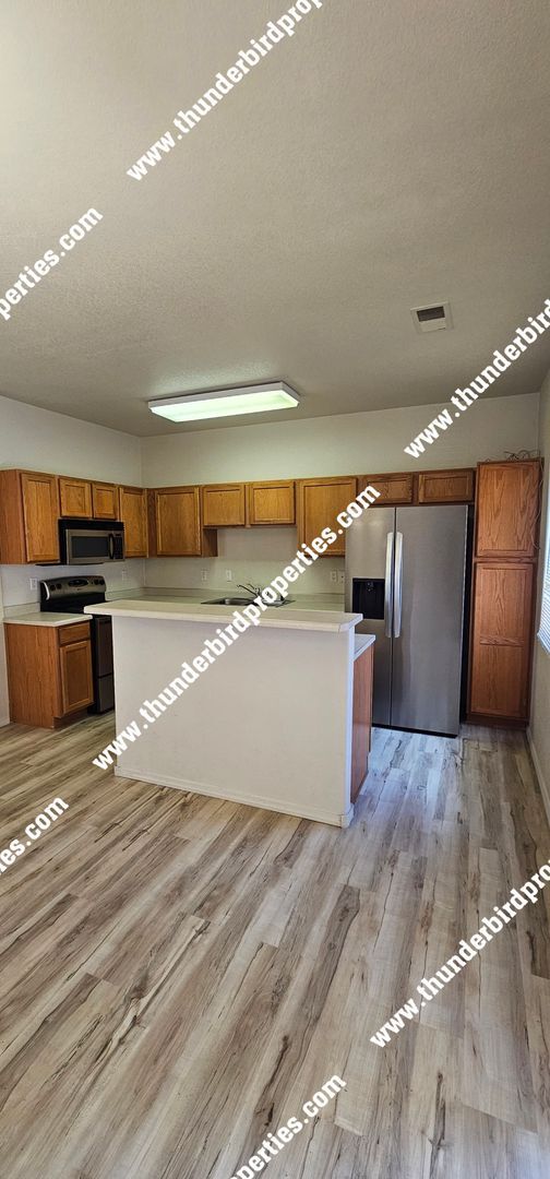 Photo - Gated Community 2 Bedroom, 2.5 Bathroom, 2 Car Garage, Upstairs Loft & Backyard. Available NOW!