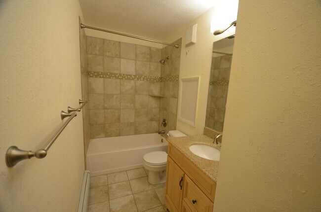 Photo - Updated Apartment!  Parking for 2 Cars! HEAT Included!