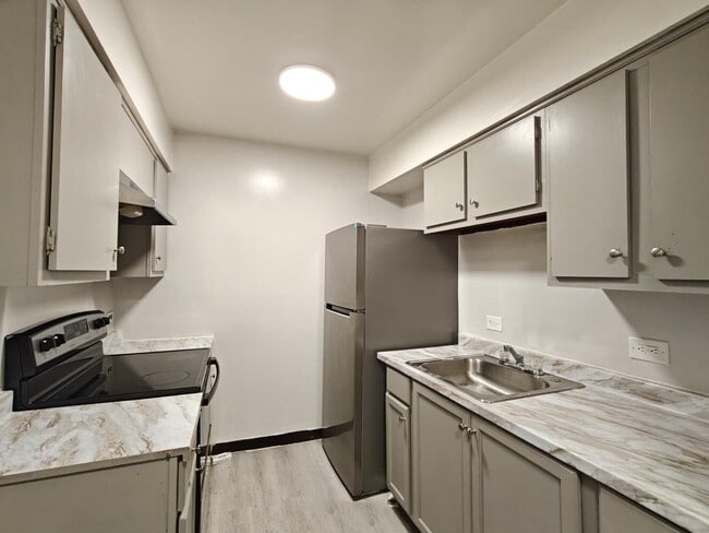 Building Photo - 4891 Stenton Ave Unit 308