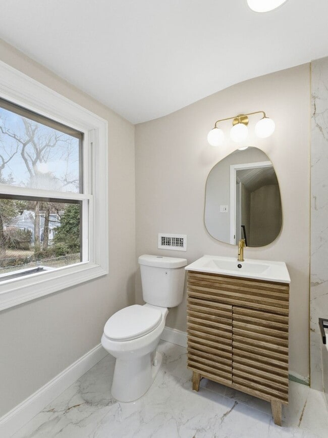Photo - Newly Renovated Pennsauken Rental with Sunroom-Style Back Room, Glass Wall & Basement