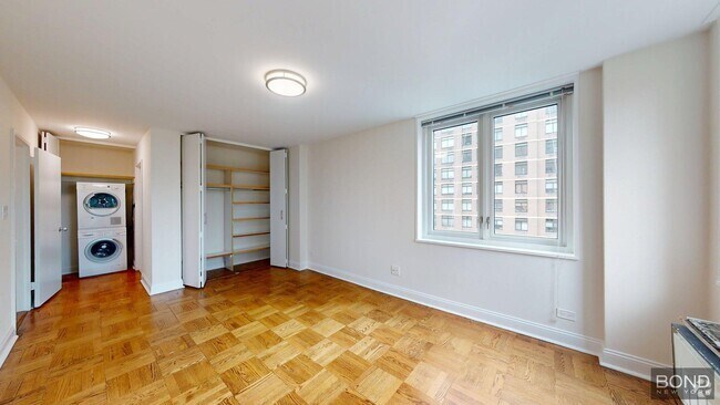Building Photo - 400 E 71st St Unit 12E Rental