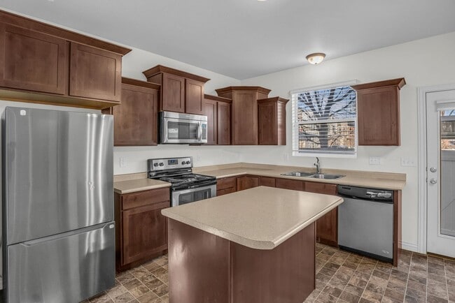 Photo - Spacious 4BR End-Unit Townhome | Low-Maintenance HOA Living