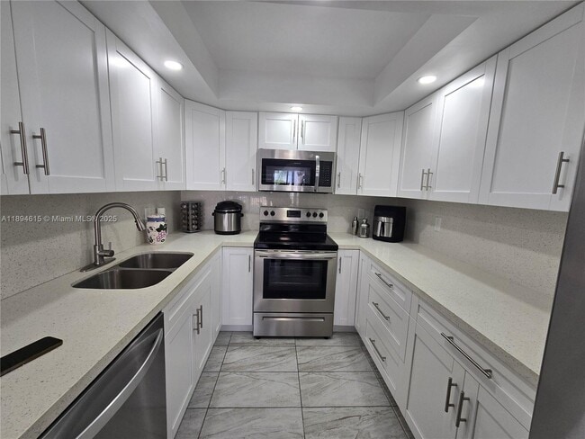 Building Photo - 10801 SW 109th Ct Unit D201