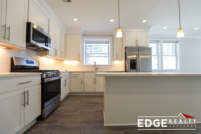 Building Photo - 100 Kenrick St Unit 1 Rental