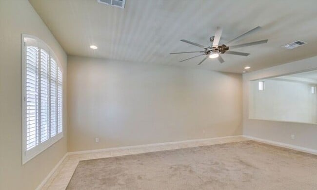 Photo - Bright & Spacious 5-Bedroom Home with 3-Car Garage in 89141