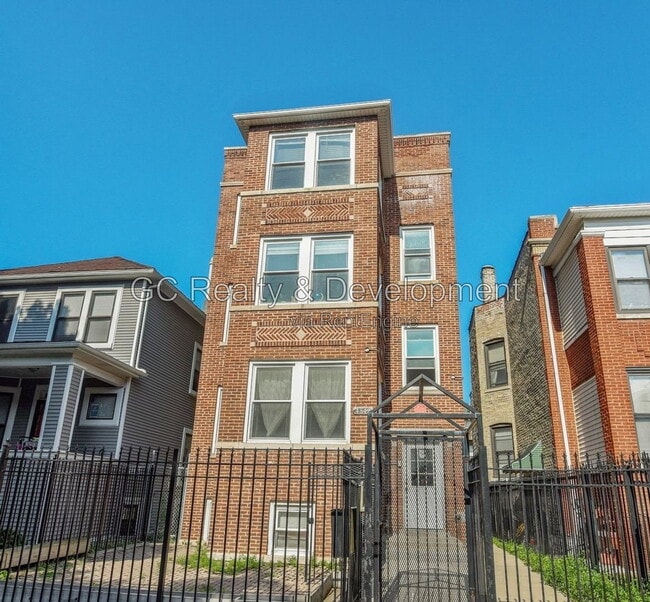 Building Photo - 4842 N Albany Ave Unit 3