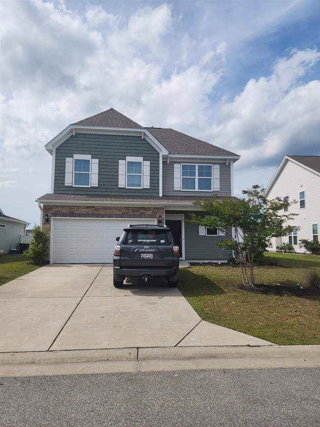 Building Photo - 5527 Redleaf Rose Dr