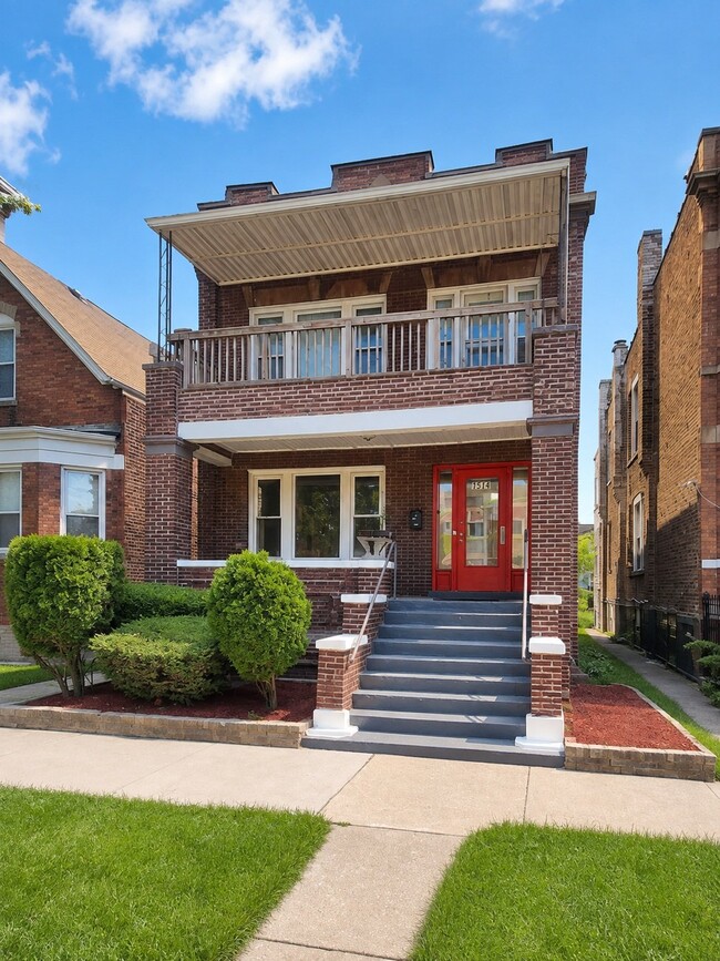 Building Photo - 7514 S Langley Ave Unit 1