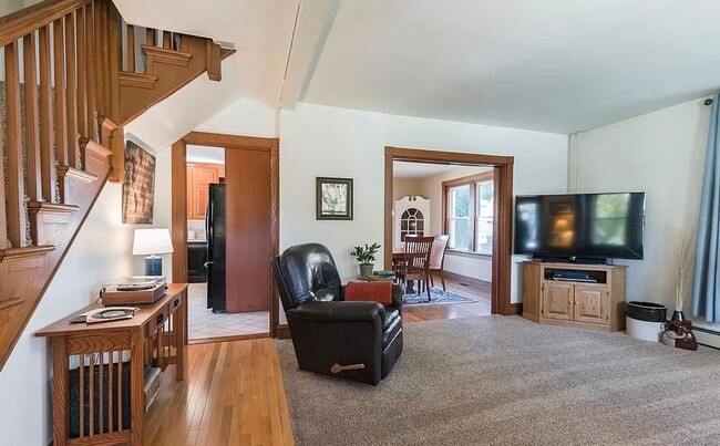 Photo - Spacious 4-Bedroom Home with Sunroom, Garage & Private Driveway!