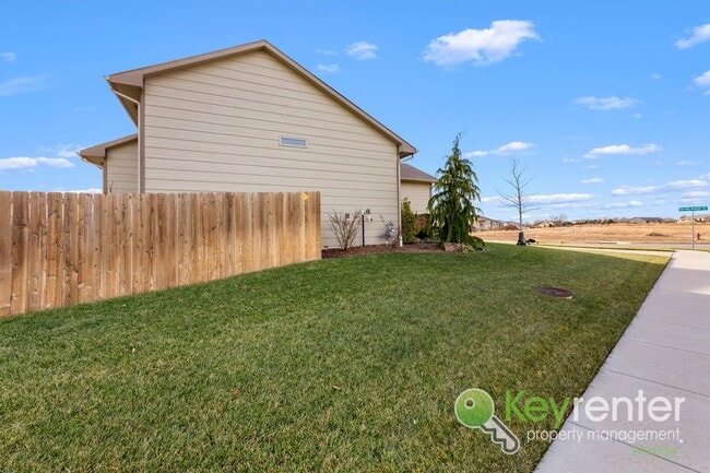 Photo - Spacious 4-Bedroom Home with Finished Basement & 3-Car Garage – Derby, KS