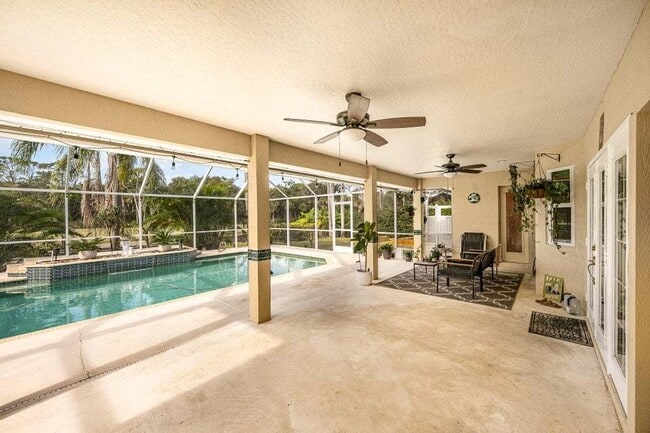 Photo - Luxurious 4 Bed/2.5 Bath Home with Stunning Lake and Golf Course Views with Pool on Savannahs Tra...