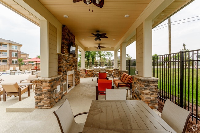 Gas BBQ dining area at pool