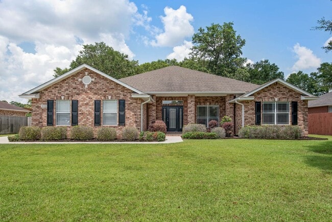Building Photo - Stunning 4-Bedroom Home with Scenic Lake V...