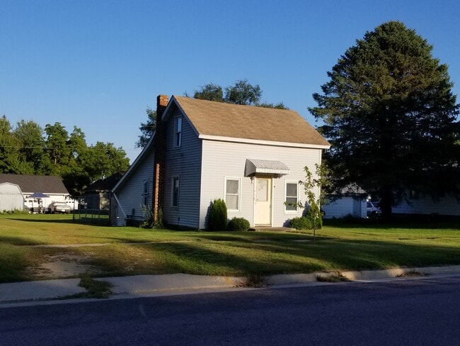 Building Photo - Gray House by Church
