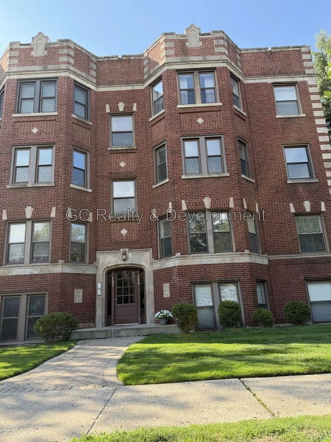 Building Photo - 702 Reba Pl Unit 201