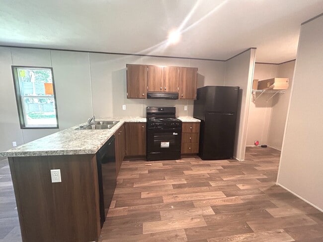 Photo - Brand new 4BR Mobile Home - Country living with City convenience!