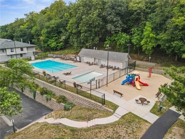 Photo - Spacious End-Unit Townhome with Fireplace, Family Room, 2-car Garage, Community Pool & Playground...