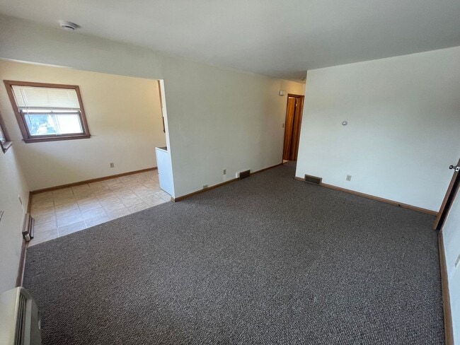 Building Photo - 9736 W Oklahoma Ave Unit 4